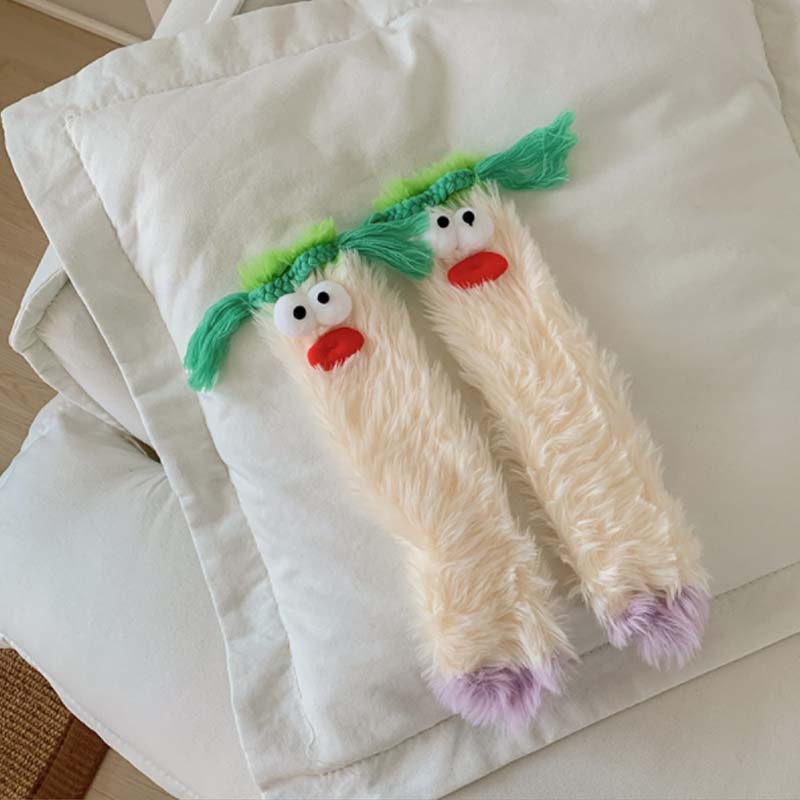 Varma mysiga fluffiga tecknade monsterstrumpor