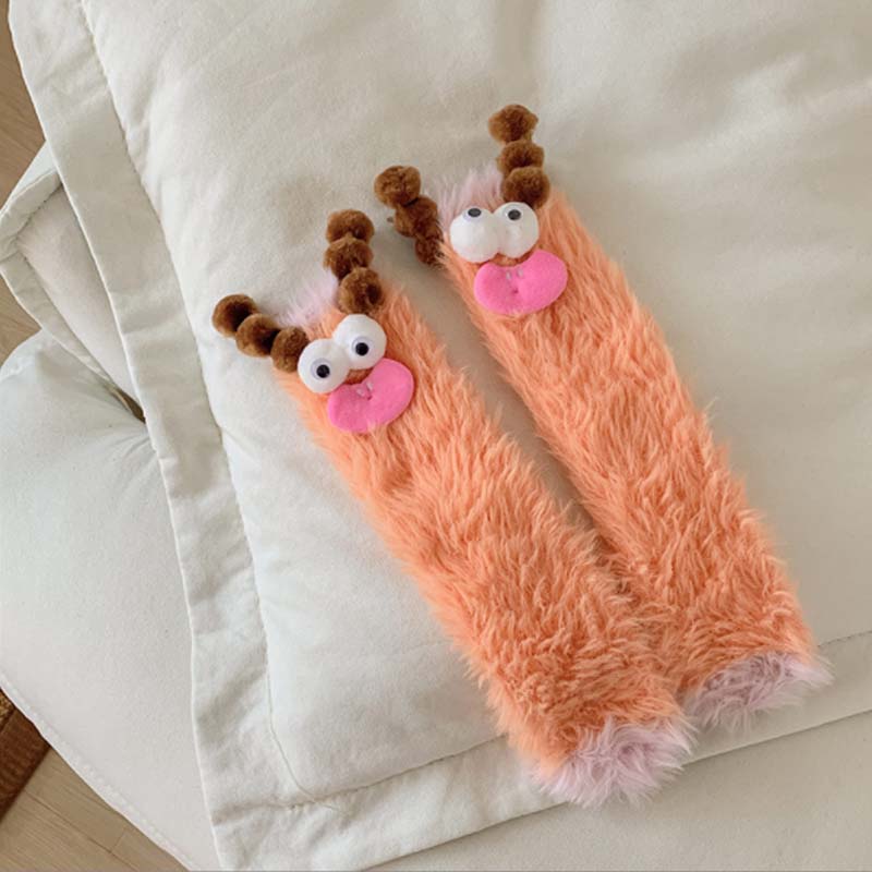 Varma mysiga fluffiga tecknade monsterstrumpor