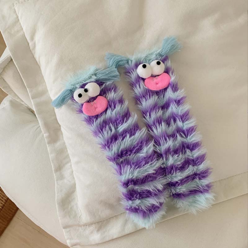 Varma mysiga fluffiga tecknade monsterstrumpor