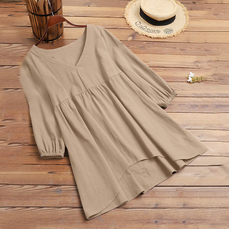 V-ringad blusklänning i bomull