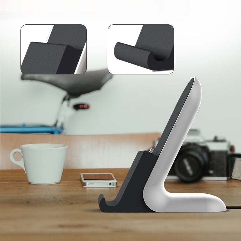 Telefonställ med plats för laddningskabel