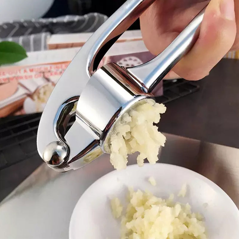 Vitlökspress med ergonomiskt handtag
