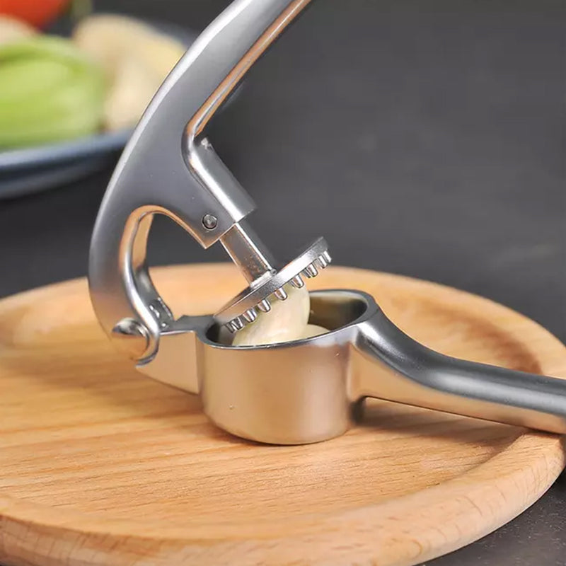 Vitlökspress med ergonomiskt handtag