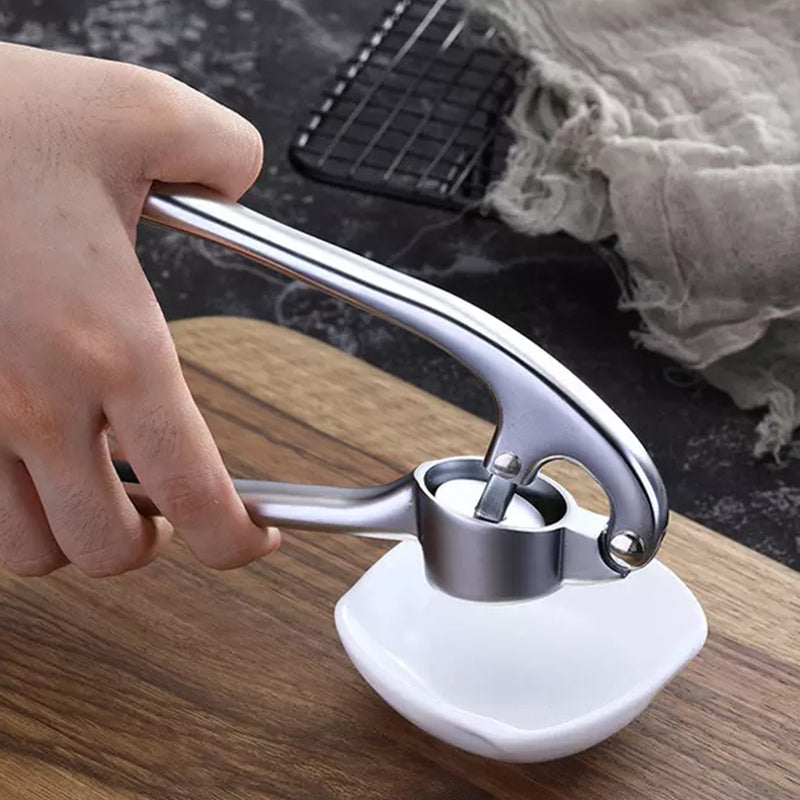 Vitlökspress med ergonomiskt handtag