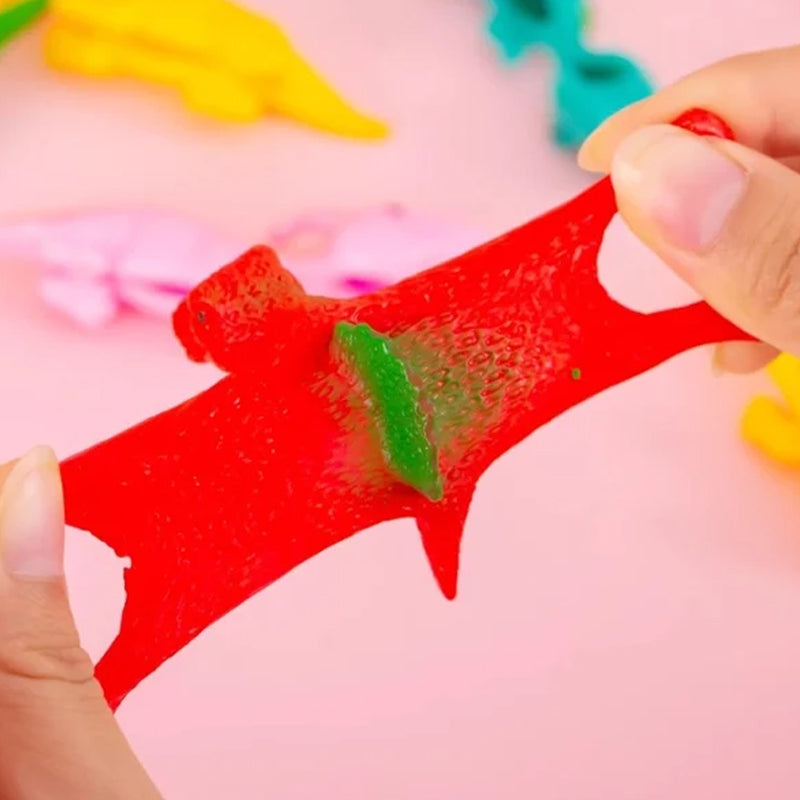 Slingshot Dinosaurieleksaker (slumpmässiga färger)