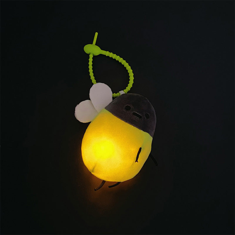 Interaktiv glödmask-plush nyckelhänge
