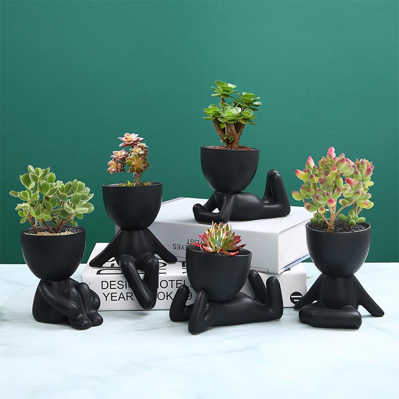 Small people flower pots