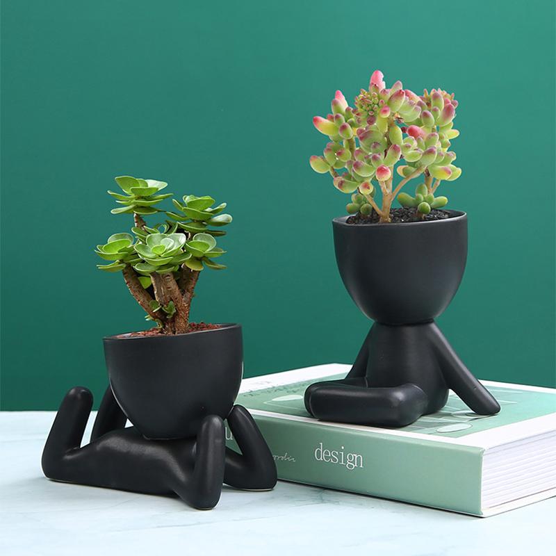 Small people flower pots
